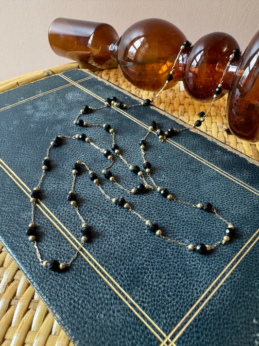 Collana lunga palline nere