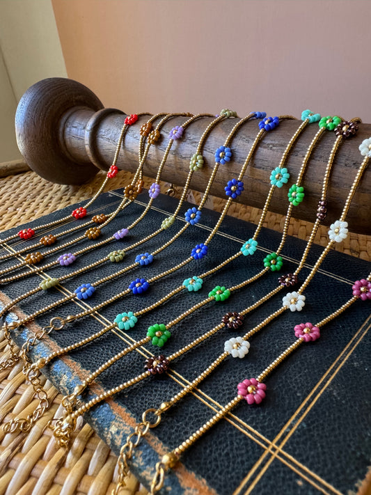 Bracciali margherite con perline