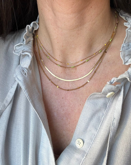 Collana scia dorata multigiri con smaltini